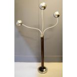 A Mid-Century chrome standard lamp, with three articulated lights of spherical for, with a brown