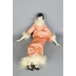 A 1920s Pierrot puppet.