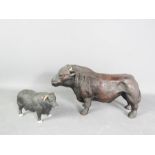 Two ceramic bulls.