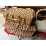 Two baskets including a picnic hamper.