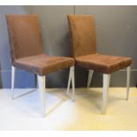 A pair of Italian Presotto designer Flex dining chairs.