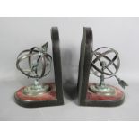 A pair of armillary sphere book ends.