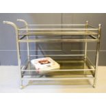 A Mid-Century chrome and glass tea trolley.