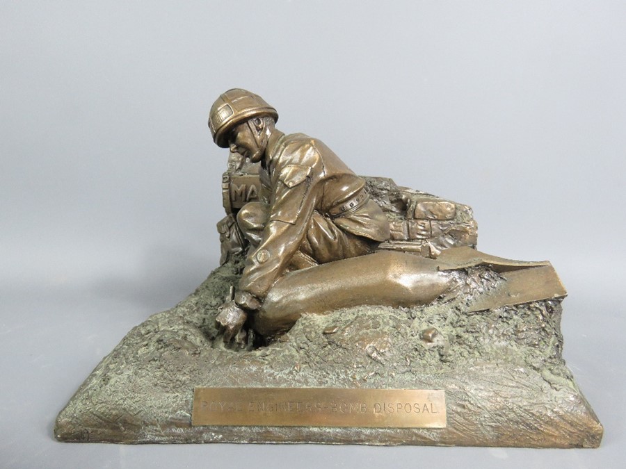 A Royal Engineers bomb disposal bronzed figure.