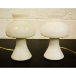 Two white 1950s glass table lamps.