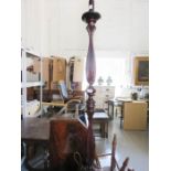 A mahogany lamp stand.