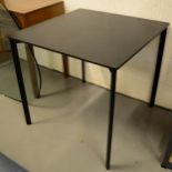 A Magis Tavalo black dining table.