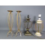 Two table lamps and a pair of pricket sticks.