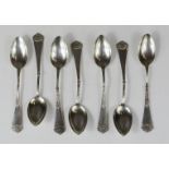 A seven silver Danish spoons with swag handles.