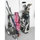 A group of golf clubs, a Golden Bear golf bag, with eleven golf clubs, Ladies Sin Mountain golf