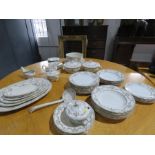 A large dinner service, made by Booths Silicon China, to include tureens, graduated meat platters,