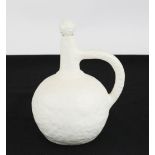 A studio ware ceramic bottle with stopper, white glazed.