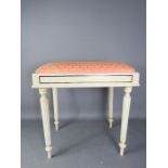 A dressing table stool.
