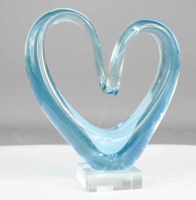 A Murano glass blue ornament in the form of a heart.