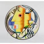 A charger depicting colour portrait, abstract face.