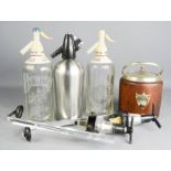 A 1930s ice bucket together with three soda syphons, two optics and a quantity of bulbs.