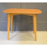 A 1950s teak occasional table.