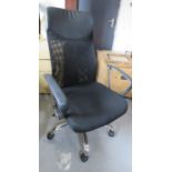 A black office swivel chair.