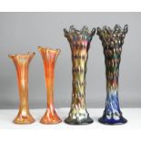Two pairs of Carnival glass vases.