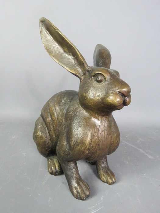 A bronzed model hare.