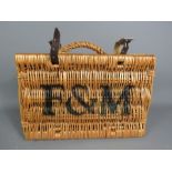A Fortnum & Mason picnic basket.