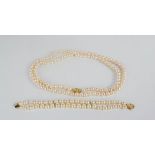 A 14ct gold and pearl set; pearl and diamond ring, earrings, necklace and bracelet, each pearl 5mm