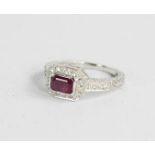 A 9ct white gold, diamond and pink ruby rectangular cut, size J, 2.8g.