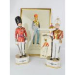 A pair of 20th century figures: both Cold Stream guards, a volume of Infantry Uniforms, and a framed