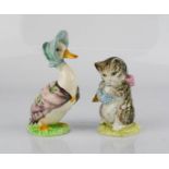 Two Beswick figurines: Jemima Puddleduck and Miss Moppet, 10cm high.