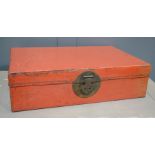 A Chinese travelling trunk / document case in red lacquer.