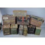 A quantity of ammo tins, and a tin box with handle.