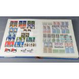 A stamp album containing Mint stamps.