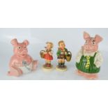 Two Wade Natwest piggy banks, together with two Goebel figures 12cm.