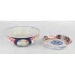 A small Chinese dish depicting bats, a bowl and a group of 19th century Imari plates with