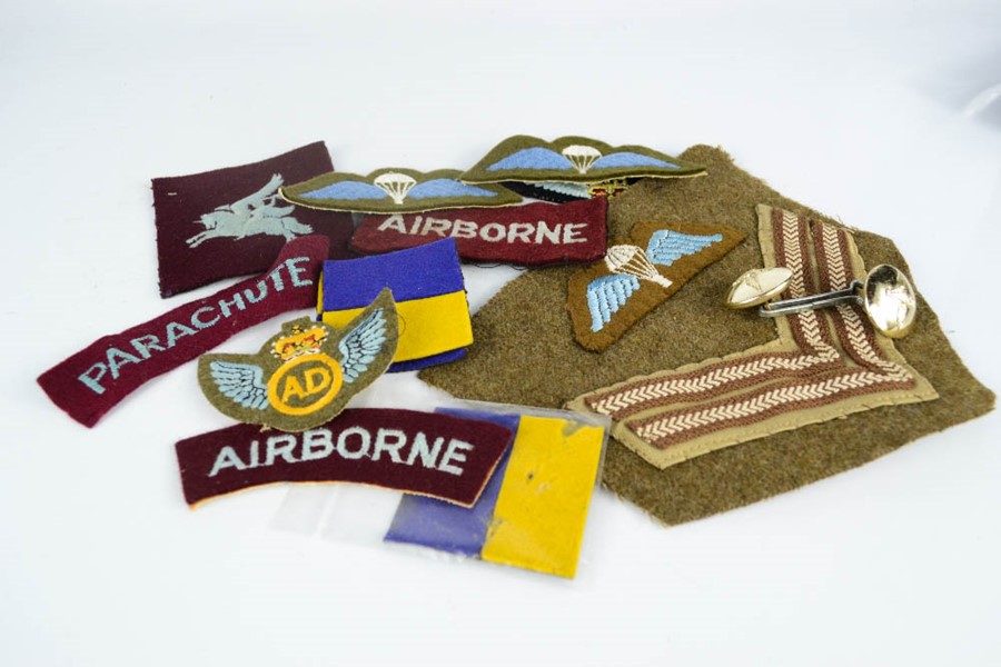 A selection of British Airborne cloth insignia.