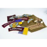 A selection of British Airborne cloth insignia.