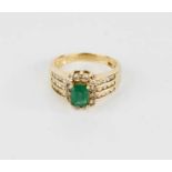 A 14ct gold, emerald and diamond ring, 6.3g.