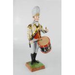 A Dresden porcelain figure of a soldier, 29cm.