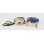 A silver and enamel trinket box a silver bangle and a nail buffer, 4.13toz. A/F