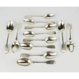 A set of twelve silver tea spoons, London 1870, engraved C, 8.05toz.