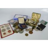 A large quantity of world coins, examples to include 18th to the 20th century.