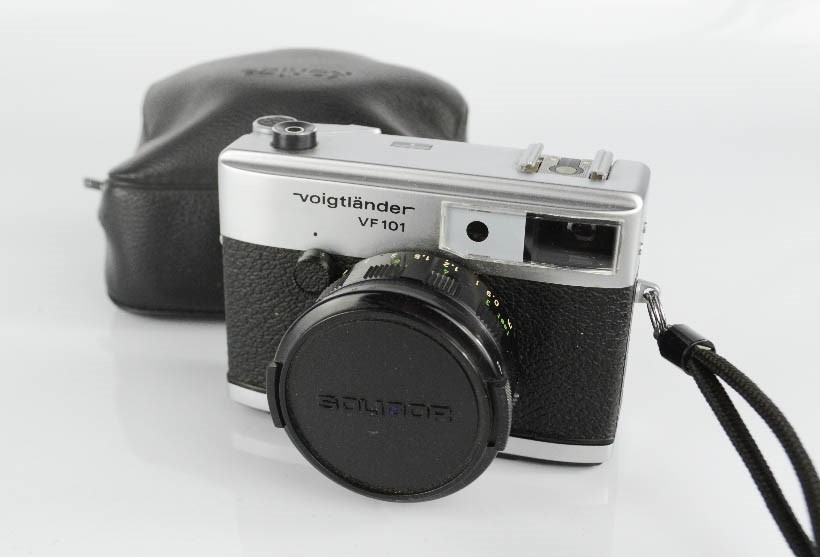 A Voigtlander VF101 camera by Rollei & Zeiss Ikon Nettar camera.