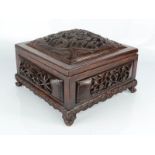 A Chinese carved box, late 18th/early 19th century, with pierced and carved lid depicting a dragon