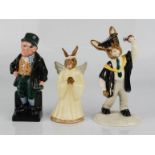 A Royal Doulton Angel Bunnykins, Graduation Day Bunnykins, and Bill Sykes.