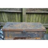 A large tin trunk, with handles 26 by 106 by 43cm.