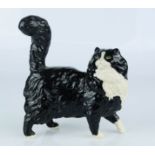 A Royal Doulton black and white cat.