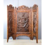 A 19th century Chinese carved screen, circa 1870, pierced and carved with scrollwork and dragons.