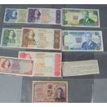 Bank notes: Southern Rhodesia 5 shillings, Kenyan uncirculated and South African examples.