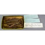 A box of antique timber nails.