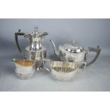 A silver plated tea service.